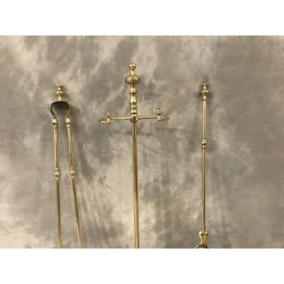 Brass fireplace servant from the 19th century