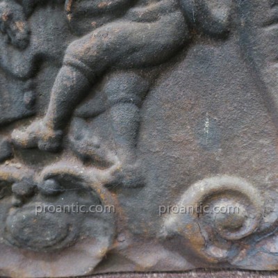 Ancient fireplace plate in period cast iron 19 th-century