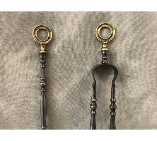 Set of a shovel and a chimney clamp in iron and bronze from the 19th century