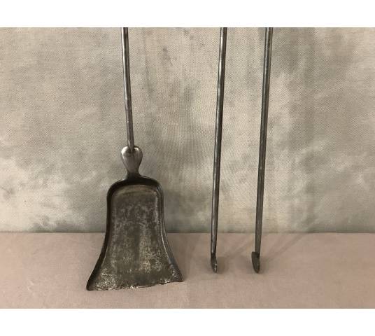 Set of a shovel and a chimney clamp in iron and bronze from the 19th century