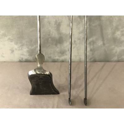 Set of a shovel and a chimney clamp in iron and bronze from the 19th century