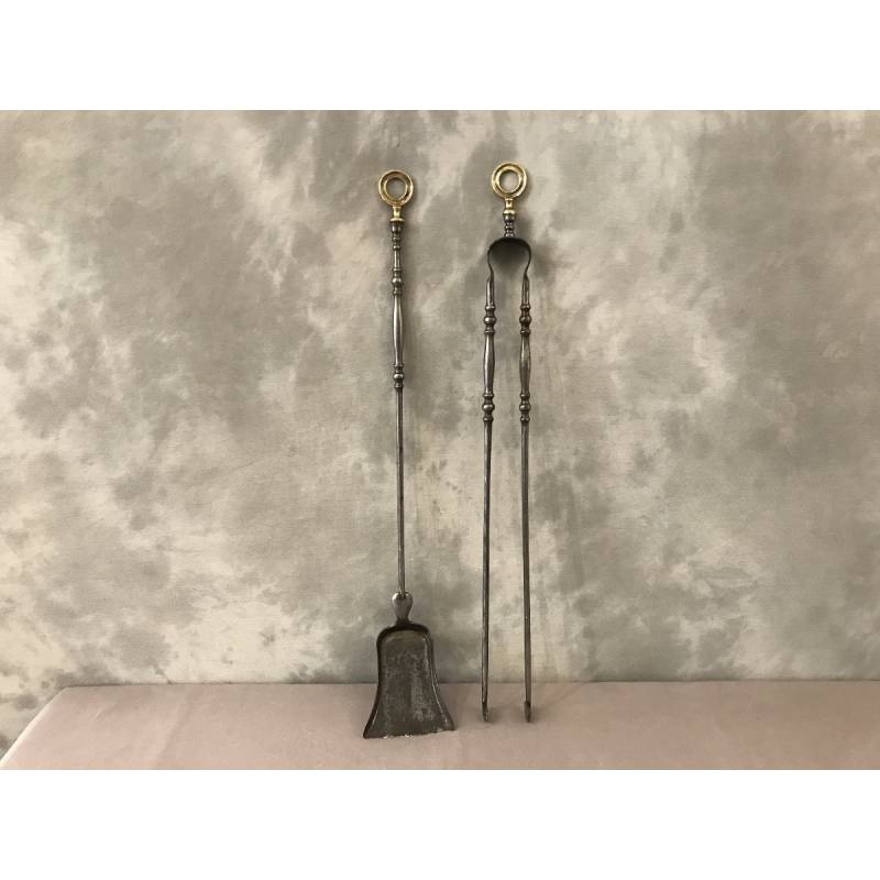 Set of a shovel and a chimney clamp in iron and bronze from the 19th century