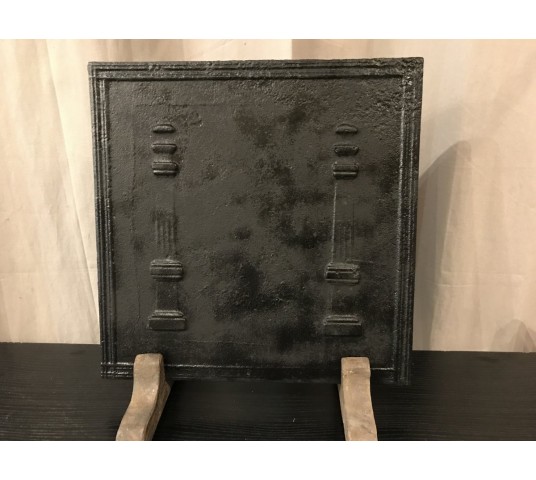 Small antique fireplace plate at the end of 18 th