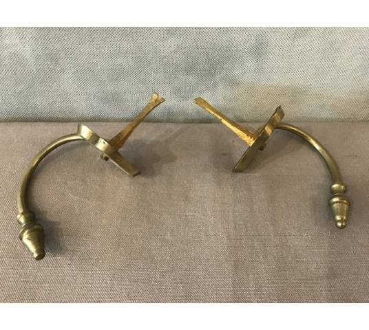 Pair of old brass fireplace hooks from the 19th century