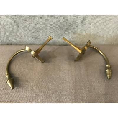 Pair of old brass fireplace hooks from the 19th century