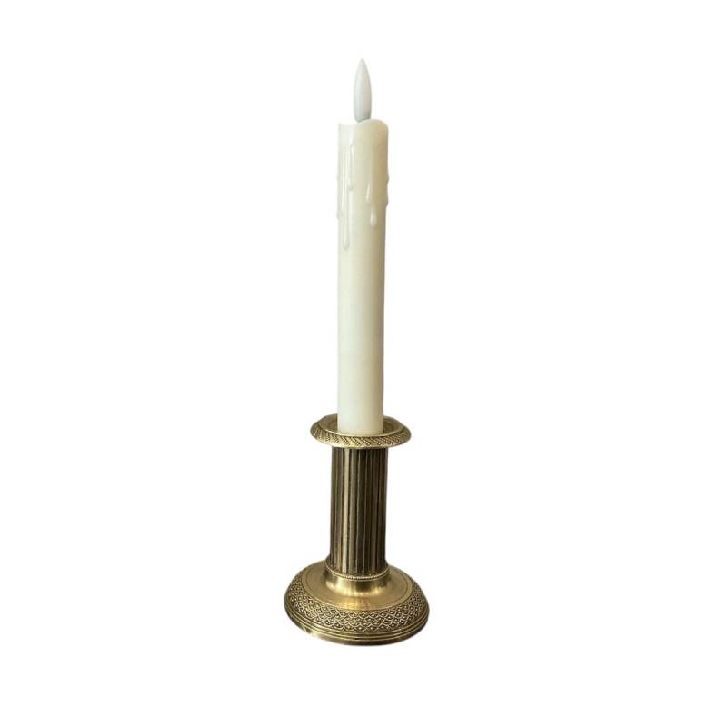 Small old bronze candle holder from the 19th century in Louis XVI style