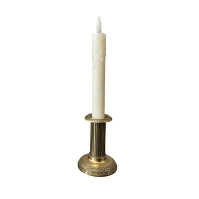 Small old bronze candle holder from the 19th century in Louis XVI style