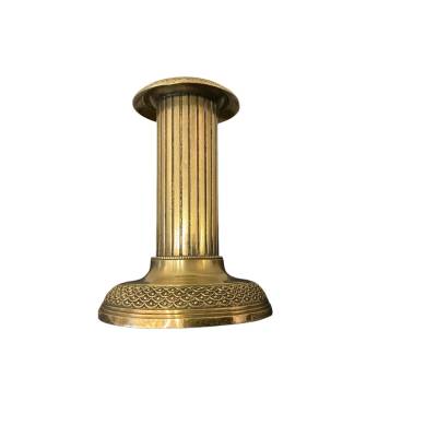 Small old bronze candle holder from the 19th century in Louis XVI style