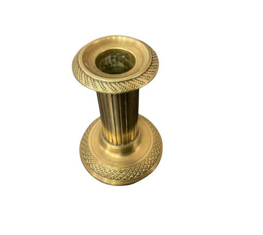 Small old bronze candle holder from the 19th century in Louis XVI style