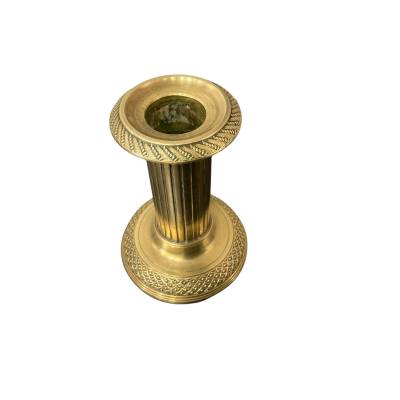 Small old bronze candle holder from the 19th century in Louis XVI style