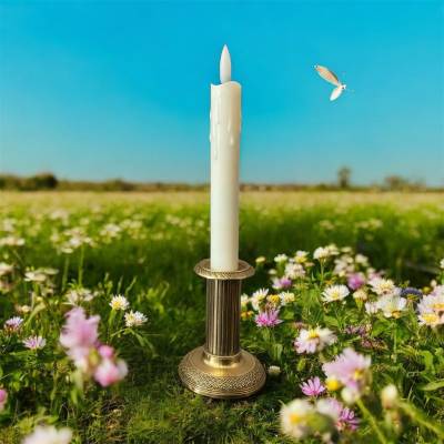 Small old bronze candle holder from the 19th century in Louis XVI style