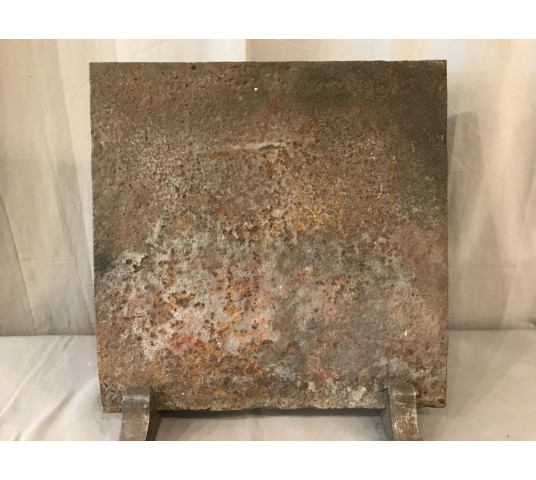 Small antique fireplace insert at the end of the period 18 th