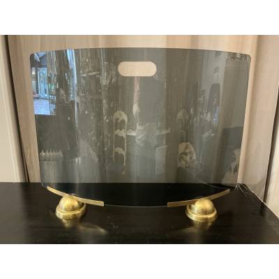 Smoked and curved glass fire screen from the 1970s