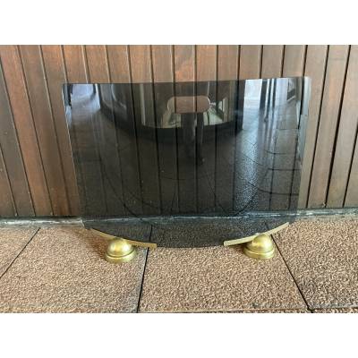 Smoked and curved glass fire screen from the 1970s