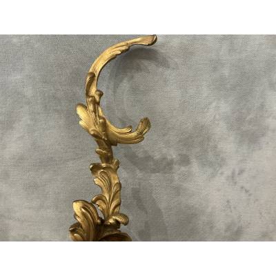 Pair of andirons, decorated with a fire motif in gilt bronze, dating from the 19th century