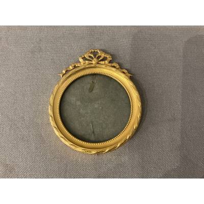 Small 19th-century gilt brass frame in the Louis XVI style