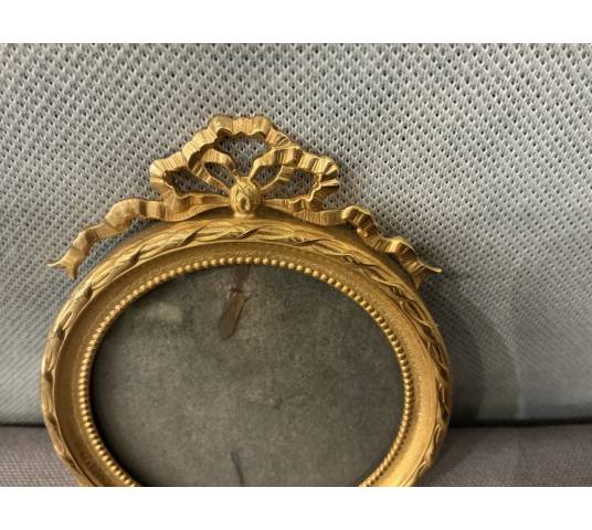 Petit cadre en laiton doré d'époque 19 ème de style Louis XVI
