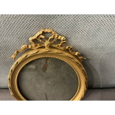 Small 19th-century gilt brass frame in the Louis XVI style