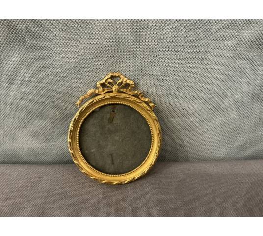 Petit cadre en laiton doré d'époque 19 ème de style Louis XVI
