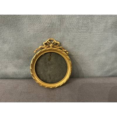 Small 19th-century gilt brass frame in the Louis XVI style