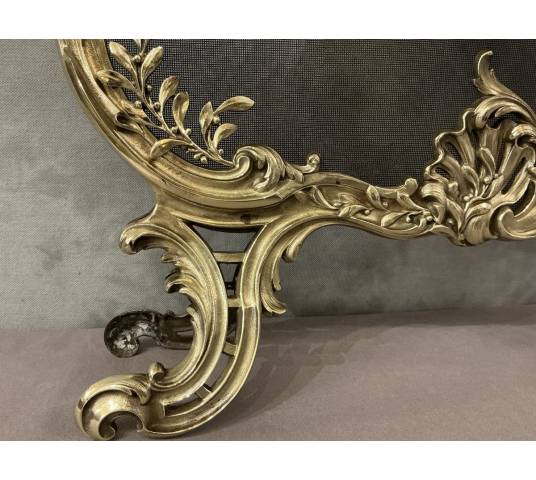 Pare feu écran de cheminée en bronze poli d'époque 19 ème de style Louis XV