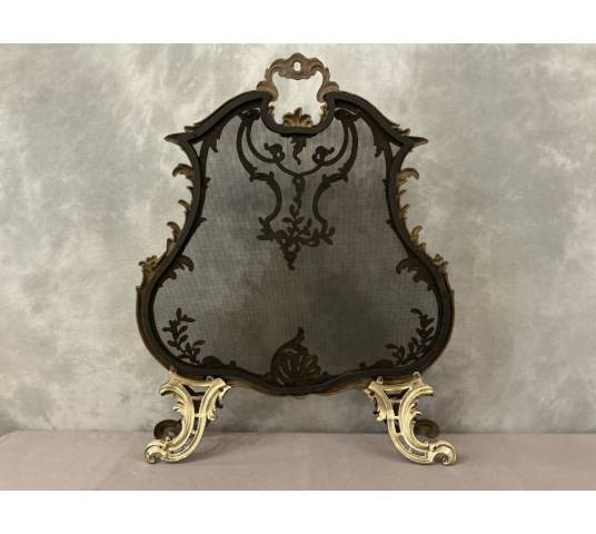 Pare feu écran de cheminée en bronze poli d'époque 19 ème de style Louis XV