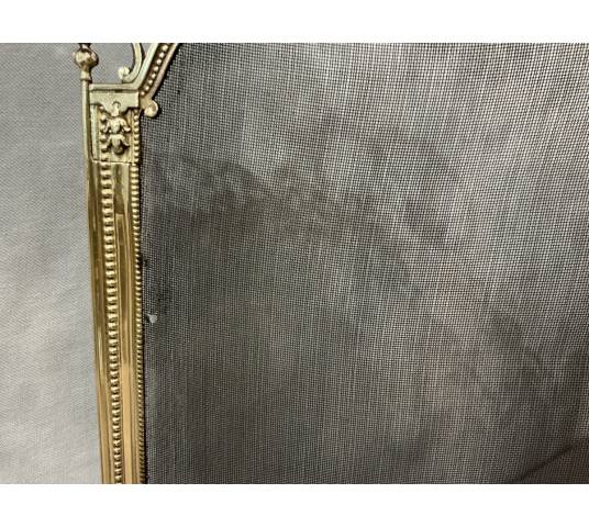 Petit pare feu de cheminée ancien en laiton et bronze d'époque 19 ème de style Louis XVI