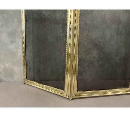 Petit pare feu de cheminée ancien en laiton et bronze d'époque 19 ème de style Louis XVI