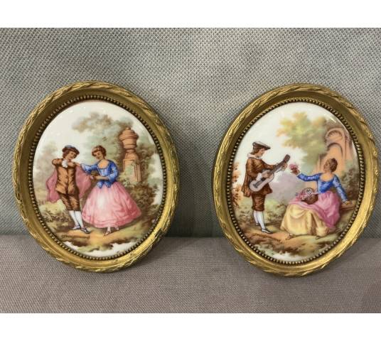 Pair of small 20th-century gilt brass and porcelain frames