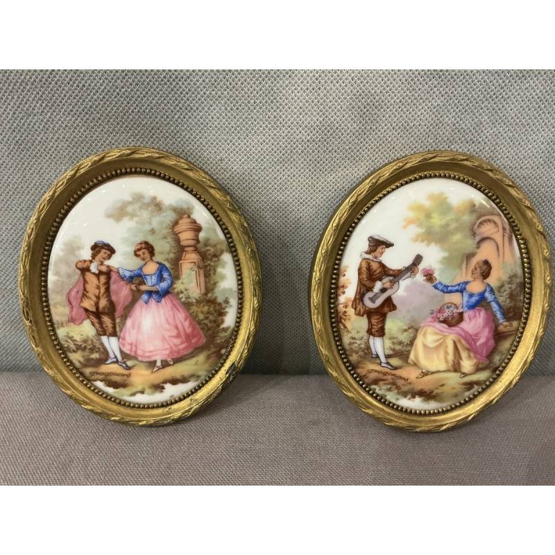 Pair of small 20th-century gilt brass and porcelain frames
