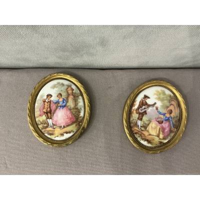 Pair of small 20th-century gilt brass and porcelain frames