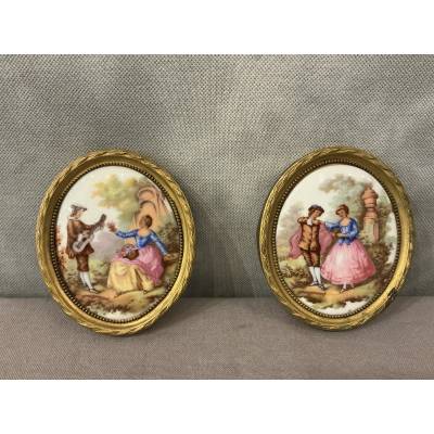 Pair of small 20th-century gilt brass and porcelain frames