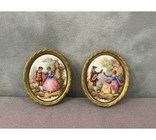Pair of small 20th-century gilt brass and porcelain frames