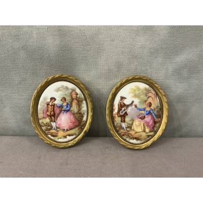 Pair of small 20th-century gilt brass and porcelain frames