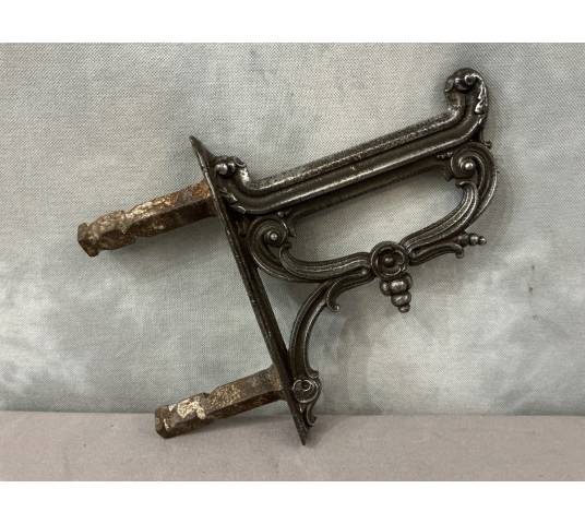 Polished cast iron foot scraper from the 19th century