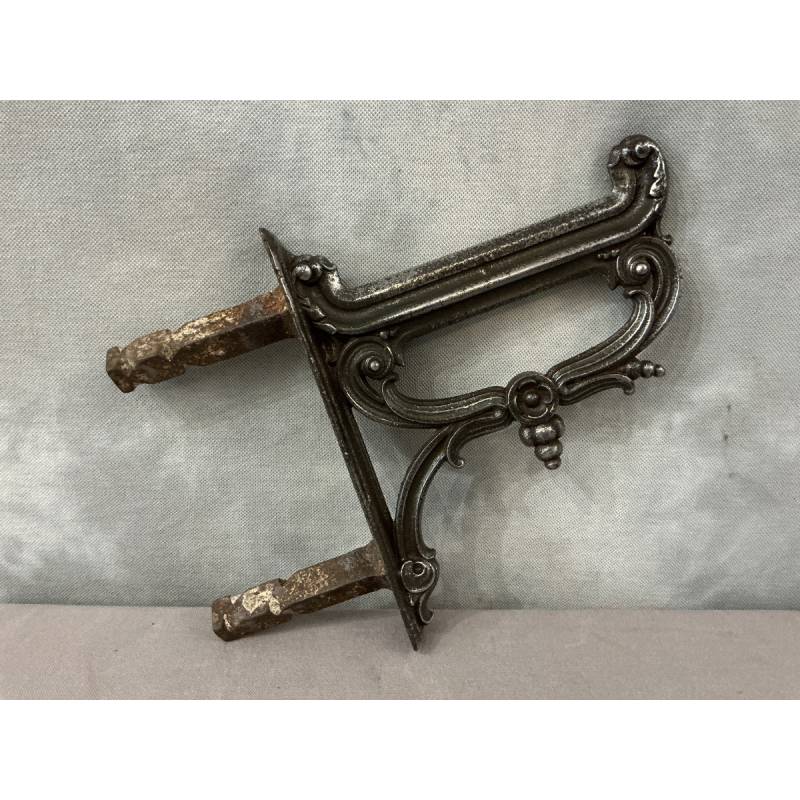 Polished cast iron foot scraper from the 19th century
