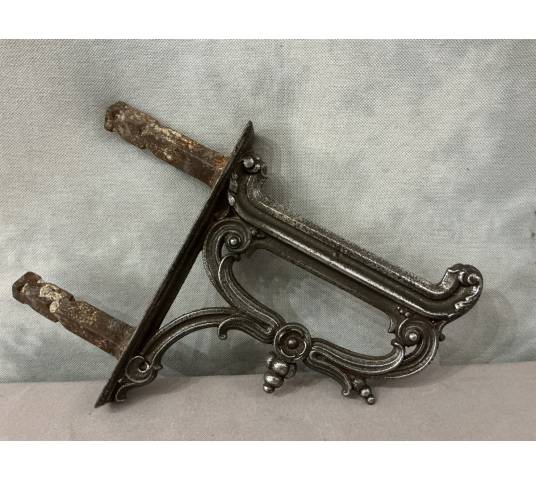 Polished cast iron foot scraper from the 19th century