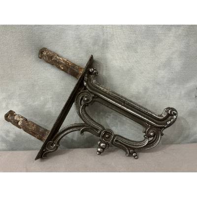 Polished cast iron foot scraper from the 19th century