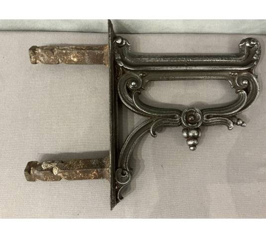 Polished cast iron foot scraper from the 19th century