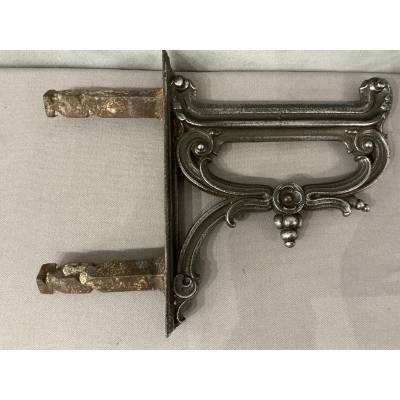 Polished cast iron foot scraper from the 19th century