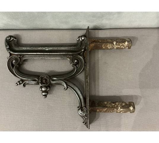 Polished cast iron foot scraper from the 19th century