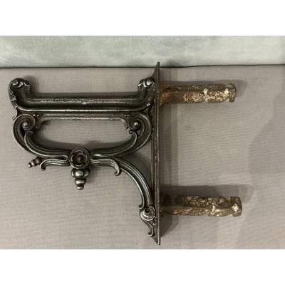 Polished cast iron foot scraper from the 19th century