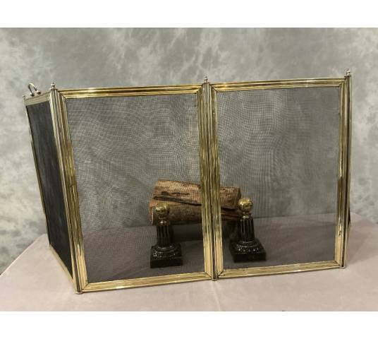 Antique polished brass fireplace screen from the 19th century