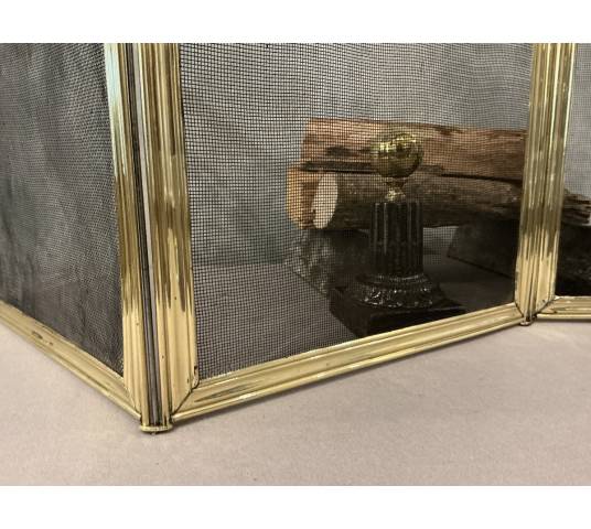 Antique polished brass fireplace screen from the 19th century
