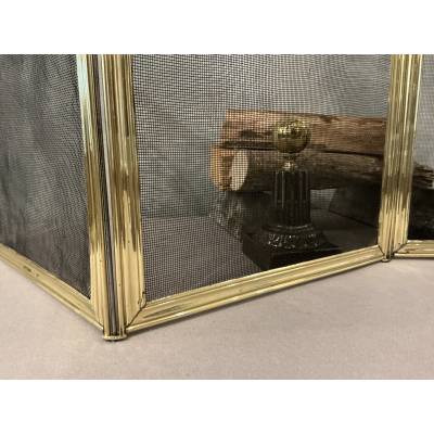 Antique polished brass fireplace screen from the 19th century