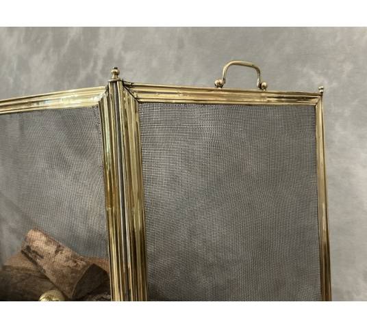 Antique polished brass fireplace screen from the 19th century
