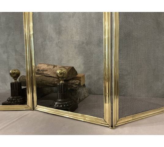 Antique polished brass fireplace screen from the 19th century