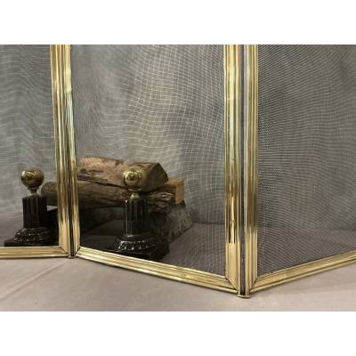Antique polished brass fireplace screen from the 19th century