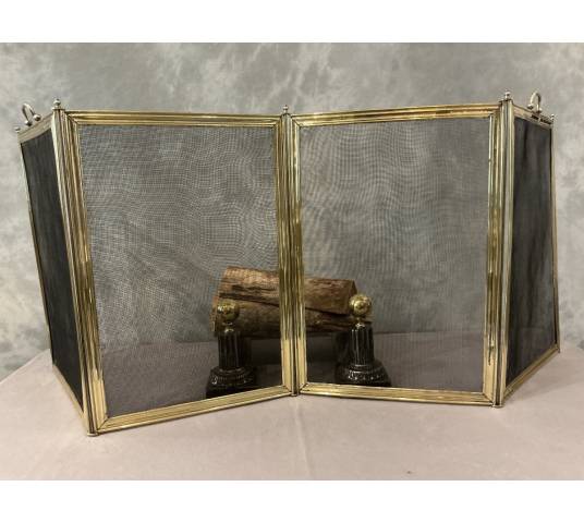Antique polished brass fireplace screen from the 19th century