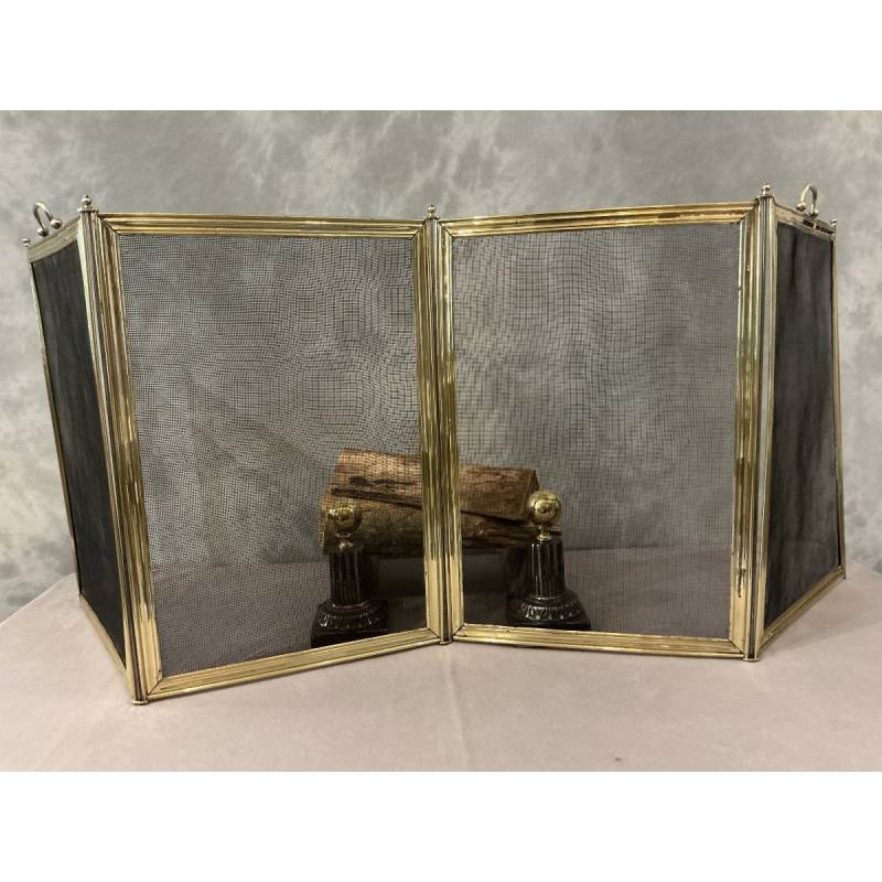 Antique polished brass fireplace screen from the 19th century